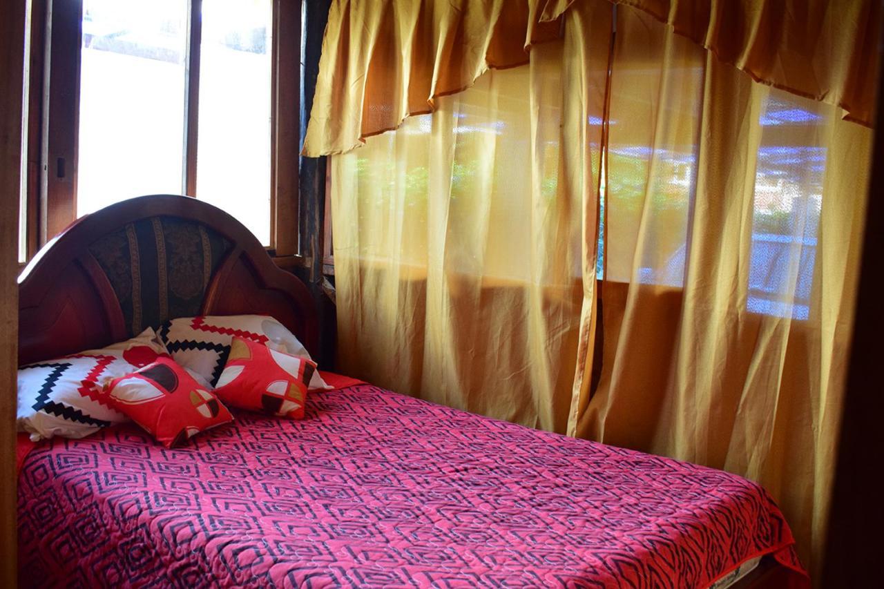 Hostal Los Farolitos Mindo Ngoại thất bức ảnh